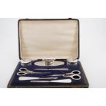 A cased silver manicure set, Birmingham 1921