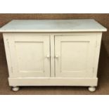 A Victorian painted pine kitchen dresser. 120 cm x 60 cm x 87 cm.