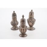 Three silver pepperettes, tallest 8 cm