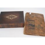 An album and decorative box containing a quantity of late 19th Century and other postcards