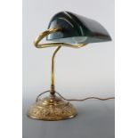 A brass desk lamp