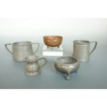 A 1920s Arts and Crafts influenced Craftsman Pewter sugar basin and cream jug, together with a