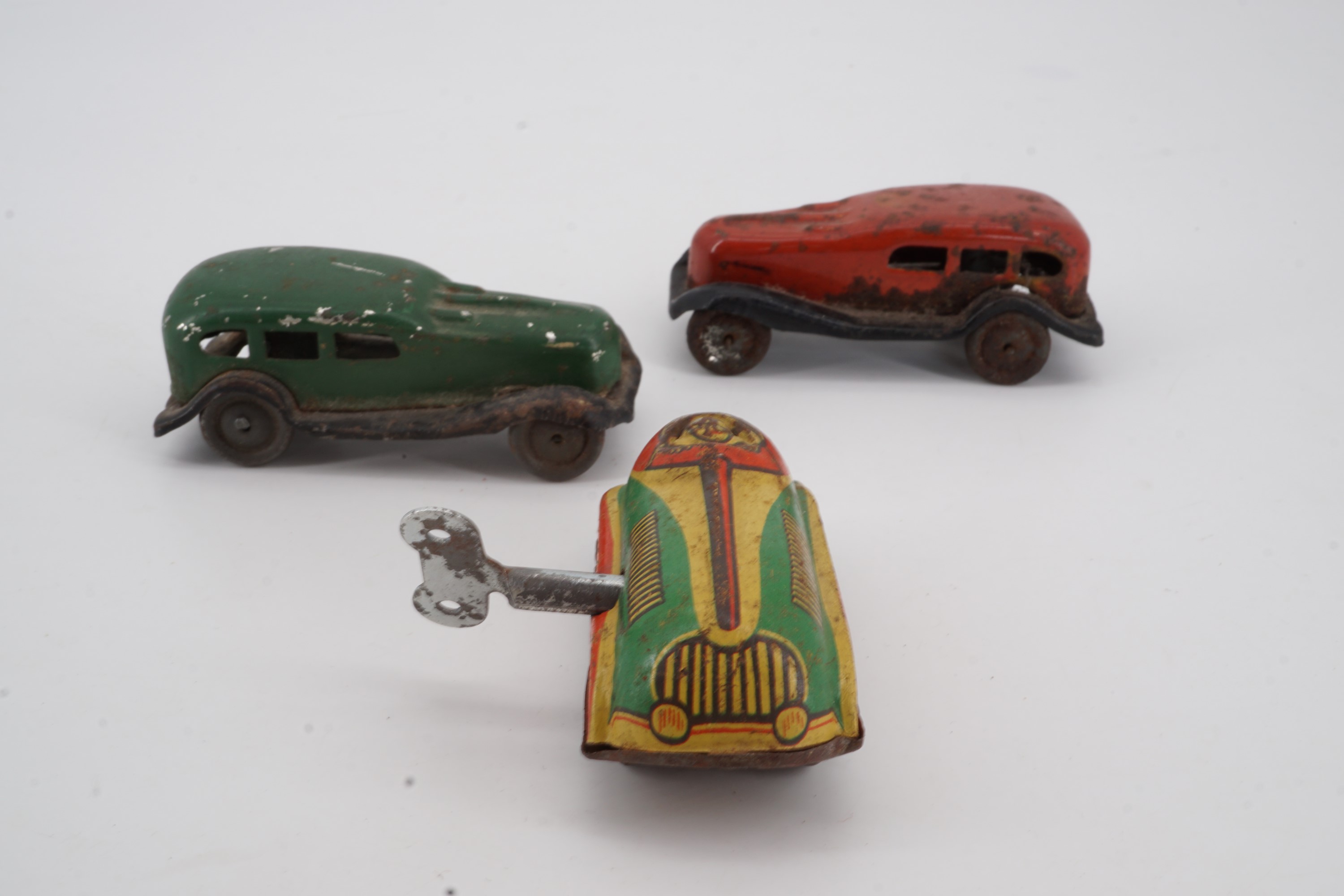 A clockwork toy car and two other German tinplate cars - Image 2 of 2