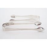 Two sets of Georgian silver sugar tongs, one bearing bright cut decoration, GB, [London], 1801,