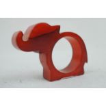 A 1930s Bakelite novelty napkin ring modelled as a stylized elephant