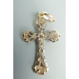 A yellow metal pendant cross, stamped 9 ct, .9 g