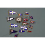 A collection of enamelled white metal and other marine and sailing club badges etc