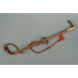 An antique antler-handled riding whip