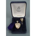 A silver heart shaped scent bottle and funnel, in presentation case, Douglas Pell Silverware,