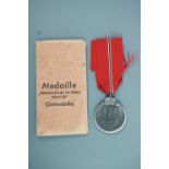 A German Third Reich Eastern Front medal in issue packet