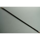 A 1920s ebonized walking cane with silver pommel, 91 cm