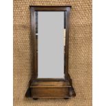 An early 20th Century oak framed wall mirror with shelf box, 89 cm high