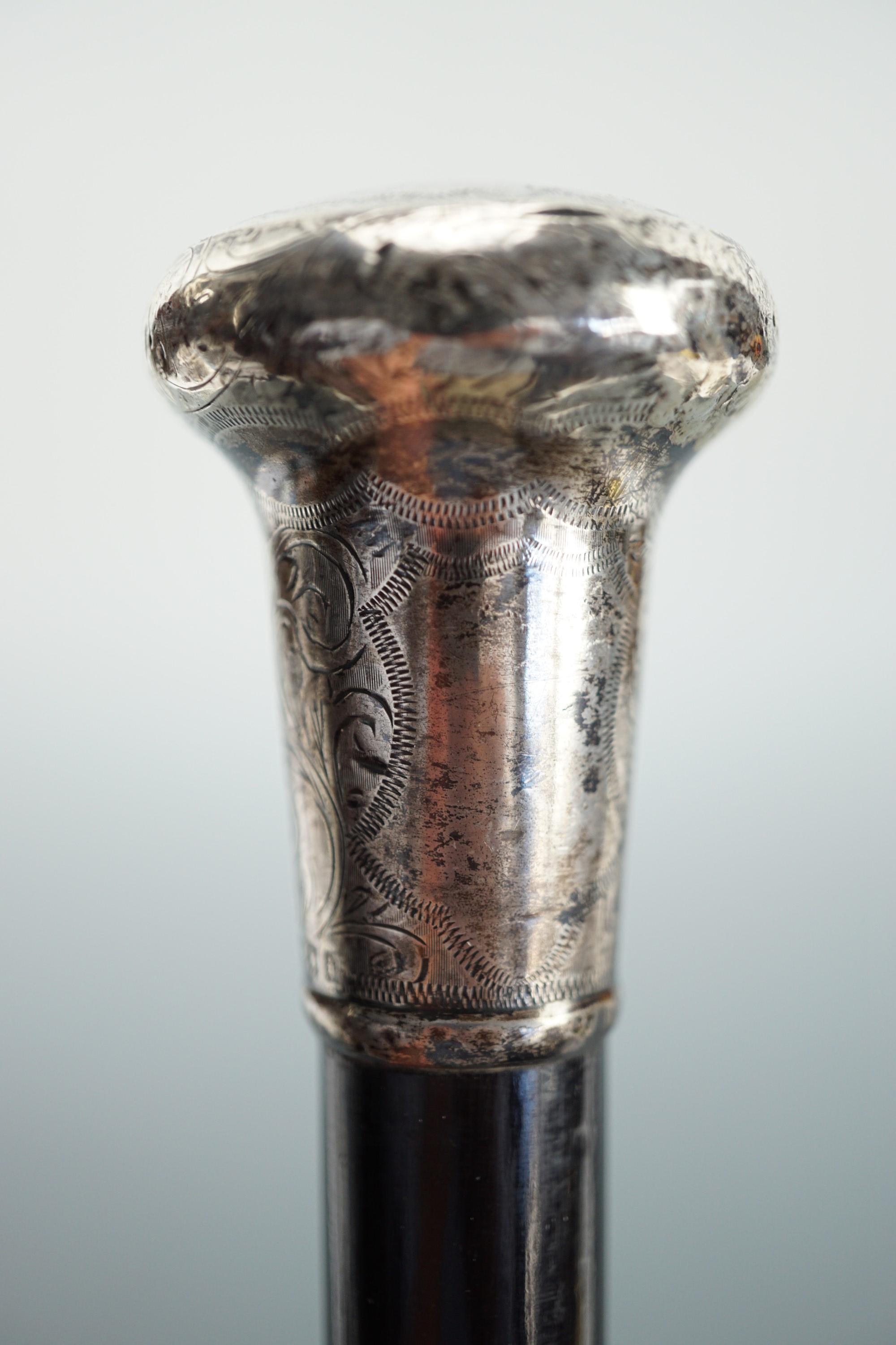 A gentleman's silver mounted ebonized evening cane, the pommel wriggle-work and engraved with - Image 2 of 4