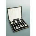 A cased set of six George V silver trefid pattern coffee spoons, Lanson Ltd, Birmingham, 1957, 59.