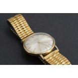 A 1960s Zodiac 9ct gold wrist watch, having a 21 jewel manual wind movement, the circular radially-