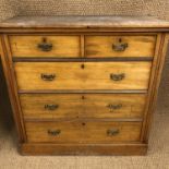 A Victorian walnut chest of two short over three long drawers with brass bale handles, 104 cm x