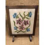 A floral embroidered oak fire screen, 58 x 78 cm