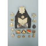 Sundry cap and other badges including a Great War Women's Army Auxiliary Corps badge