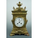 A late 19th Century French flamboyant brass-cased mantle clock, 37 cm high