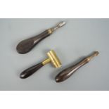 Three 19th Century gun tools comprising a powder measure, jag / reamer and nipple wrench