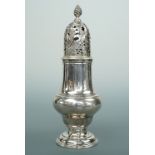 A George III silver sugar caster of baluster form, the cover reticulated and engraved in a spiral