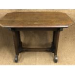 A George V oak writing table, 118 cm x 77 cm x 79 cm high