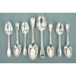 A harlequin set of six late Georgian silver reed and shell pattern dessert spoons with two table