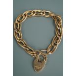 A Victorian yellow metal compound curb link bracelet with 9 ct gold padlock clasp, 14 g