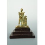 An early 19th Century cast brass relief depiction of King William IV, on terraced rosewood