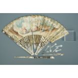 A late 18th Century mother of pearl folding fan, the paper leaf hand-painted with a figural scene