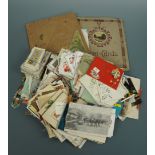 A large quantity of late 19th Century and other postcards and greetings cards etc