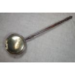 A 19th Century copper bed warming pan