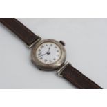 A silver trench type wristlet watch, London import marks, 1918, 26 mm case, (running)
