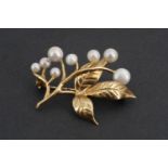 A modern 9ct gold and Scottish pearl brooch in the form of a berried sprig, 4.1g, in a late 19th