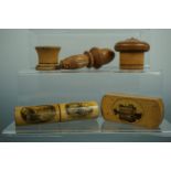 Treen and Mauchline ware, comprising a turned and carved thimble and needles case, a puzzle box