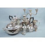 A quantity of electroplate including candelabra, four piece tea set, cream jug (a/f), gallery