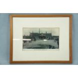 A framed photograph of Station Approach, Workington, 48 x 38 cm