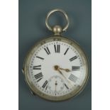 A late 19th Century nickel-cased pocket watch, having an enamelled face with Roman numerals, gilt