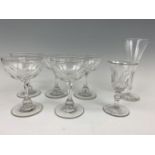 Five Victorian champagne coupes and two wine glasses