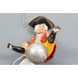 A Baron Munchausen composition doll, second quarter 20th Century, 12 cm