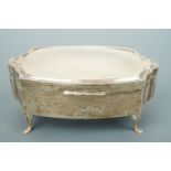 A George V silver bijouterie / trinket box, of cusped oval section, opening to reveal a petrol