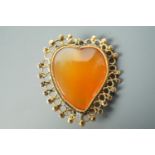 An antique yellow metal mounted heart-shaped brooch, 26 mm x 24 mm