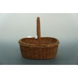 A vintage wicker hand basket, 38 cm x 28 cm x 36 cm high