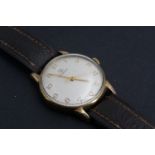 A 1960s Tissot 9ct gold wrist watch, having a 17 jewel calibre 781 manual movement, the frosted