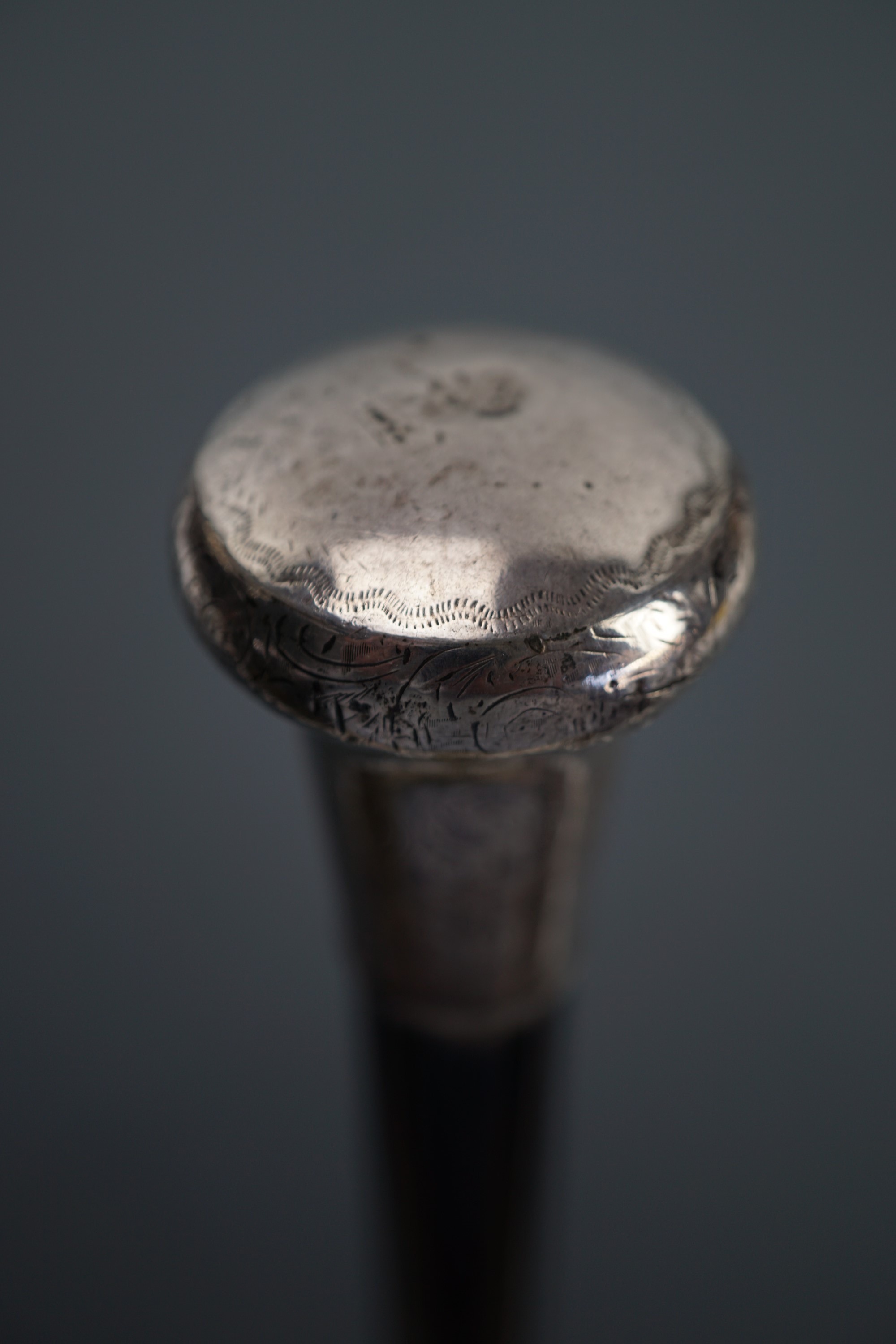 A gentleman's silver mounted ebonized evening cane, the pommel wriggle-work and engraved with - Image 4 of 4