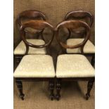 Four Victorian mahogany concealed-bolt-back balloon back dining chairs