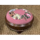 A Victorian inlaid mahogany pad stool with floral wreath tapestry top