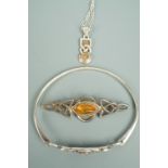 Contemporary Celtic-influenced silver and white metal jewellery comprising a bangle, brooch and