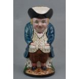 A Longniddry Scottish pottery character jug, 25 cm high