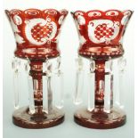 A pair of Victorian ruby-flashed and wheel cut lustres with prismatic drops, 21 cm